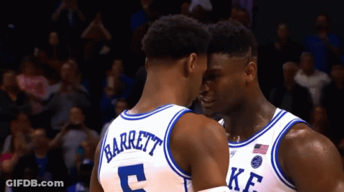 Two Duke Basketball Players Barrett And Zion Williamson Are Looking At Each Other GIF