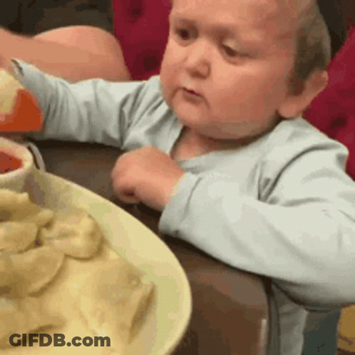 Two Dumplings Shaking Hands Saying Witam Nowego Pierozka GIF