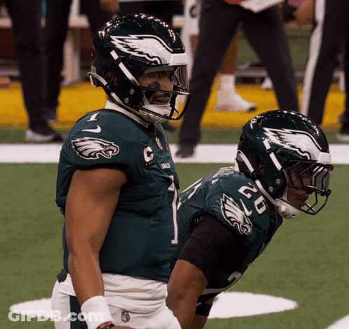 Two Eagles Football Players Number 1 And 50 GIF