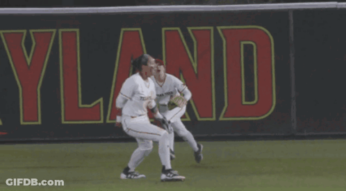 Two Female Baseball Players Running Cleveland Banner GIF