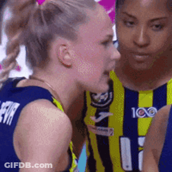 Two Female Basketball Players Are Talking To Each Other And One Of Them Has The Number 11 On Her Jersey GIF