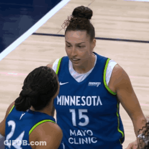 Two Female Basketball Players From Minnesota Mayo Clinic Are Talking To Each Other GIF