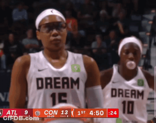 Two Female Basketball Players In Dream Jerseys GIF