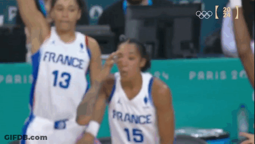 Two Female Basketball Players In Jerseys 13 And 15 GIF