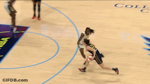 Two Female Basketball Players On A Court With A Wnba Logo In The Background GIF