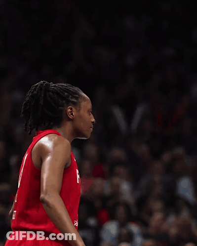 Two Female Basketball Players Wearing Red Jerseys One With The Number 8 On It GIF