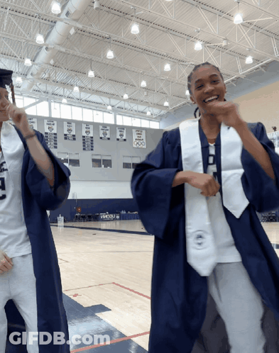 Two Female Graduates Dancing GIF