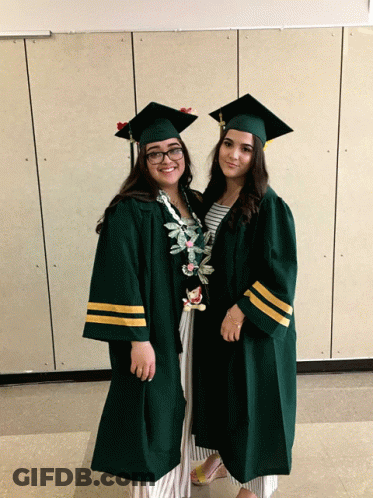 Two Female Graduates Posing GIF