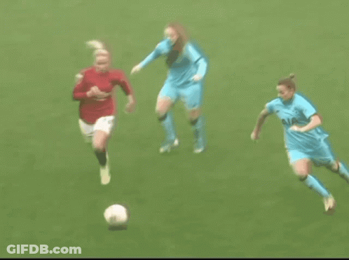 Two Female Soccer Players Playing GIF