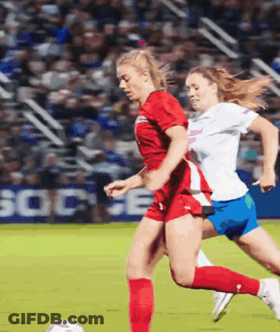 Two Female Soccer Players With Socce Sign GIF
