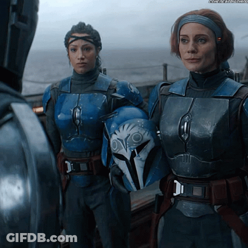 Two Female Soldiers, One Wearing Helmet GIF