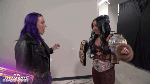 Two Female Wrestlers With New Dynamite Logo Background GIF