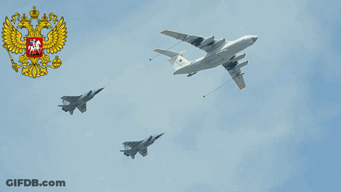 Two Fighter Jets And Cargo Plane Flying GIF
