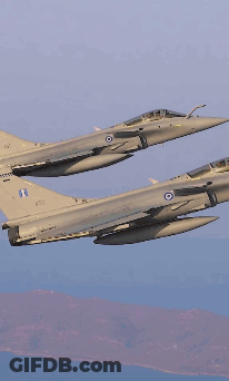 Two Fighter Jets Are Flying Side By Side With One Having The Number 1 On The Tail GIF