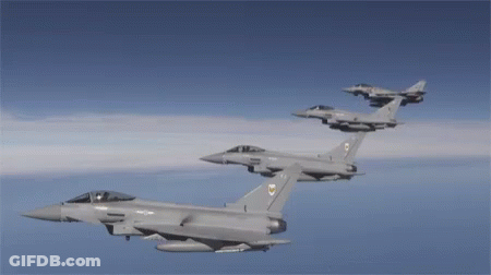 Two Fighter Jets Flying With Number 7 GIF