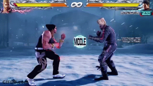 Two Fighters Are Fighting In A Video Game With The Word Middle In The Middle Of The Screen GIF