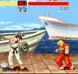 Two Fighters Battling In Video Game With Capcom Ship GIF