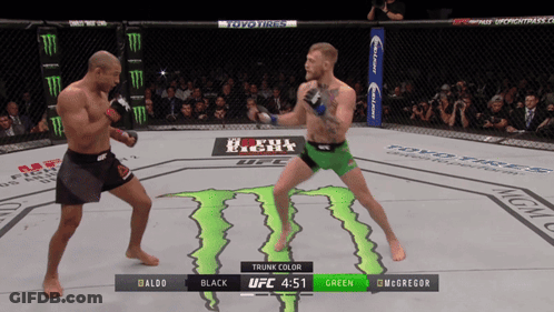 Two Fighters Fighting Monster On Floor GIF