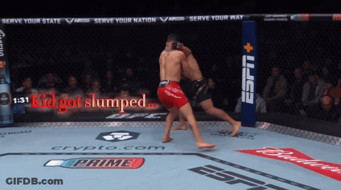 Two Fighters In A Ring With The Words Kid Got Slumped On The Screen GIF