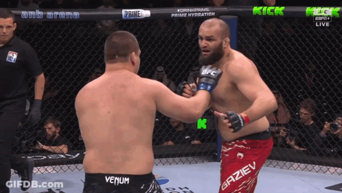 Two Fighters In Boxing Ring With Venum Shorts GIF