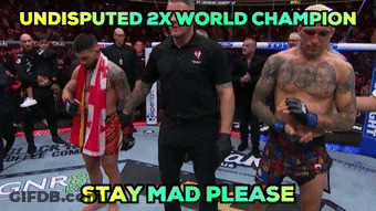 Two Fighters Standing Undisputed 2X World Champion Stay Mad Please GIF