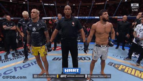 Two Fighters Standing With Heart Sign GIF
