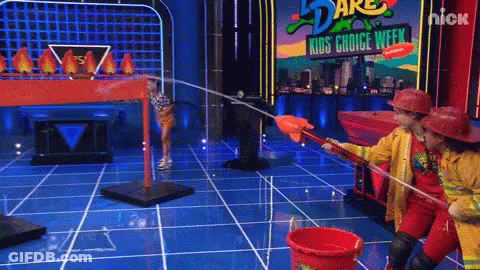 Two Firefighters Playing Game On Nickelodeon Kids Choice Week GIF