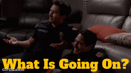 Two Firefighters Sitting On A Couch With The Words What Is Going On GIF