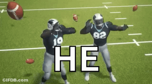 Two Football Players Are Dancing On A Field With A Football In The Background . GIF