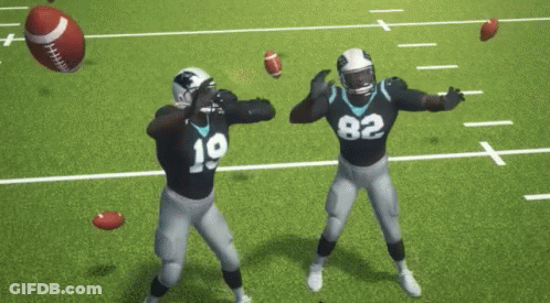 Two Football Players Are Dancing On A Field With The Words Fumble Above Them GIF