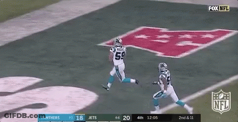 Two Football Players Are Running On A Field With A Fox NFL Logo In The Background . GIF