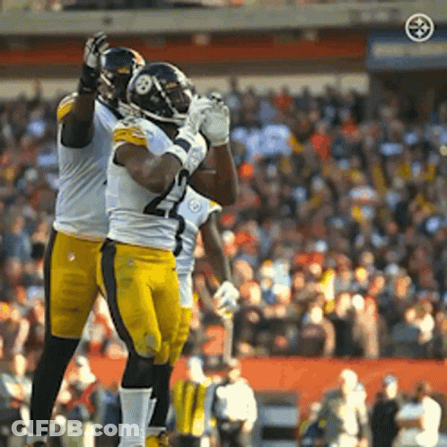 Two Football Players Celebrating Touchdown GIF