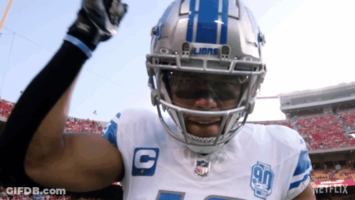 Two Football Players Celebrating Touchdown GIF