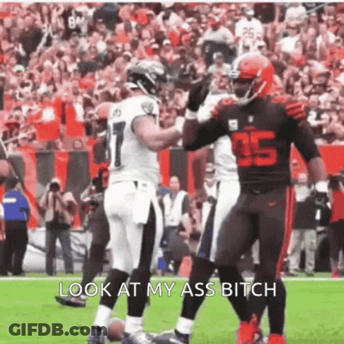 Two Football Players High Fiving Look At My Ass Bitch GIF