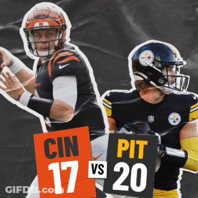 Two Football Players Holding Pit 17 Vs 20 Signs GIF
