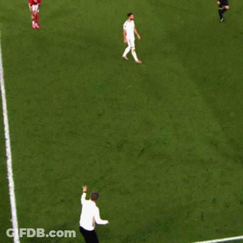 Two Football Players Hugging On Field, Number 4 Jersey GIF