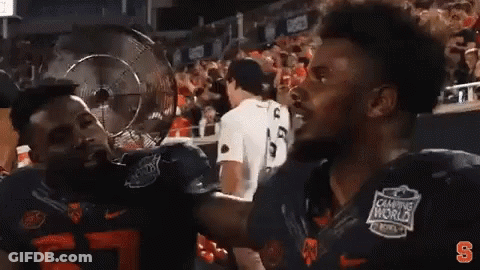 Two Football Players In Champions World Jerseys GIF