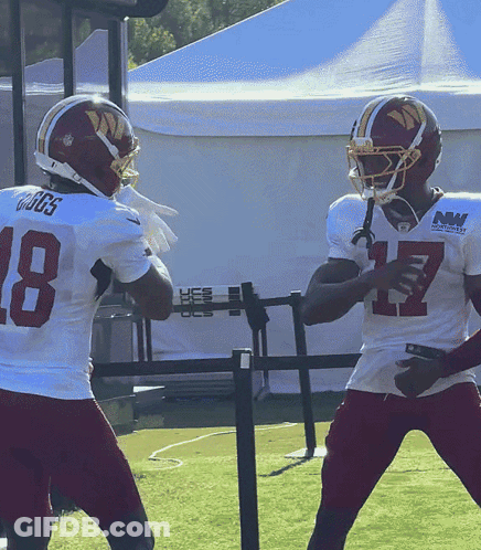 Two Football Players Number 18 GIF