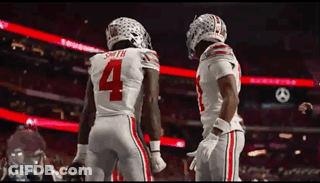 Two Football Players Number 4 GIF
