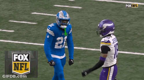 Two Football Players On A Field With The Fox NFL Logo In The Background GIF