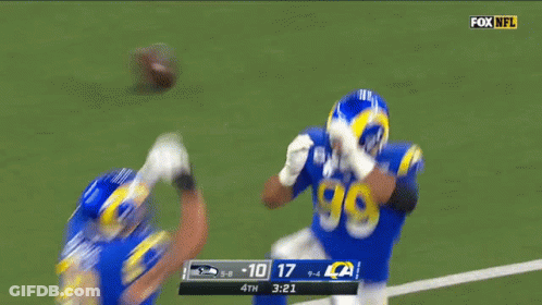 Two Football Players On Field With Fox NFL GIF