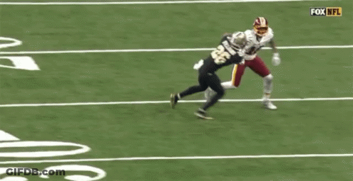 Two Football Players On Field With Fox NFL GIF