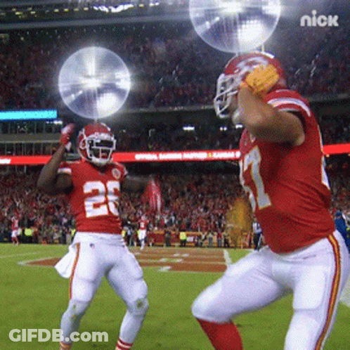 Two Football Players On Field With Nick Logo GIF