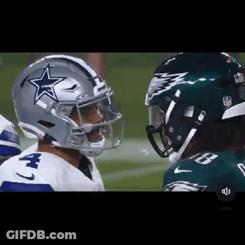 Two Football Players , One From The Cowboys And The Other From The Eagles , Are Looking At Each Other . GIF