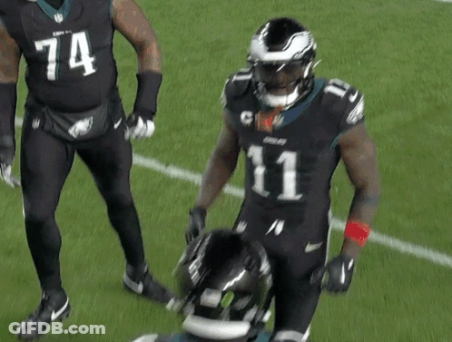 Two Football Players One Wearing Number 1 GIF
