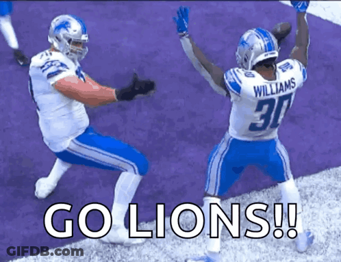 Two Football Players Saying Go Lions GIF
