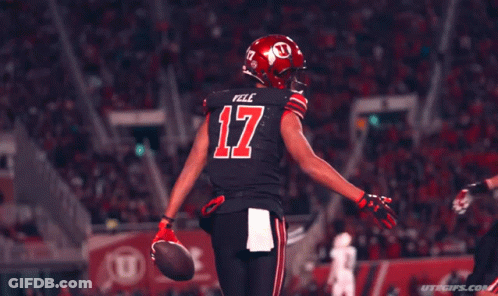 Two Football Players Shaking Hands GIF