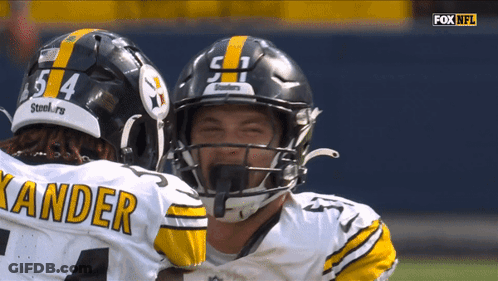 Two Football Players With Kander Jersey GIF