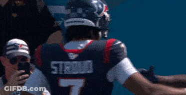 Two Football Players With Stroud On The Back Of Their Jersey Hugging Each Other GIF