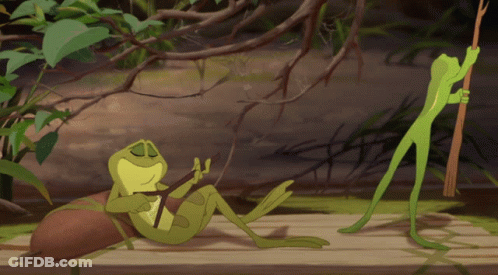 Two Frogs On Wooden Dock One Holding Spear GIF